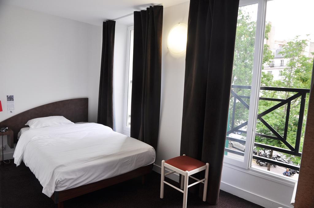 Hotel De La Tour Paris Quarto foto